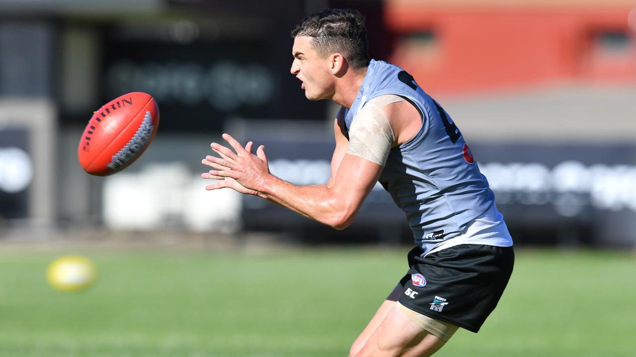 Port Adelaide’s Tom Rockliff trains at Alberton Oval ahead of clash against Brisbane. Picture: AAP Image/David Mariuz.