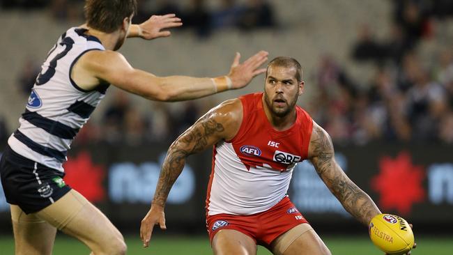 Lance Franklin tries to get around Tom Lonergan. Picture: Wayne Ludbey