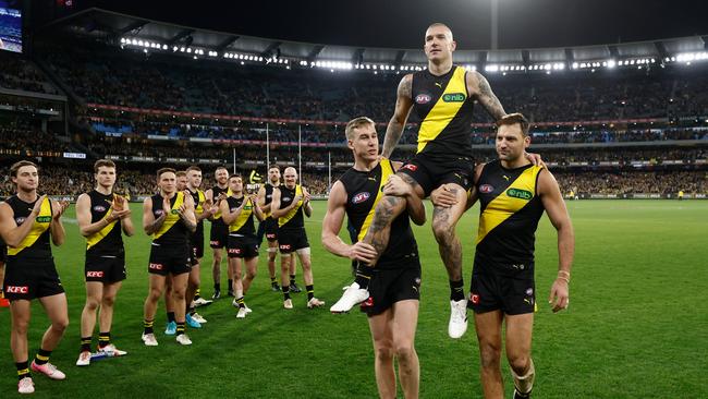 Dusty chaired off the ground. (Photo by Michael Willson/AFL Photos via Getty Images)