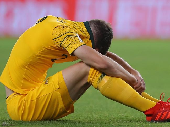 AL AIN, UNITED ARAB EMIRATES - JANUARY 25:  Milos Degenek of Australia looks dejected after  the AFC Asian Cup quarter final match between United Arab Emirates and Australia at Hazza Bin Zayed Stadium on January 25, 2019 in Al Ain, United Arab Emirates.  (Photo by Francois Nel/Getty Images)