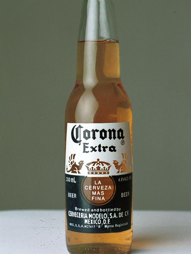 Bottles of Corona beer were sitting the car’s cup holders, court documents state.