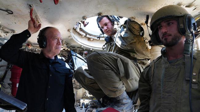 Yoav Gallant, visiting soldiers inside a self-propelled howitzer this month, says indecison about the future governance of Gaza leads to a ‘dangerous course’. Picture: AFP