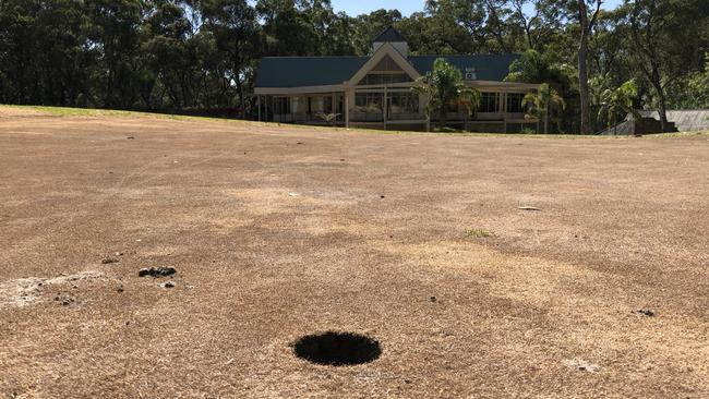 The former putting green in front of the Belair National Park Golf Course clubhouse.