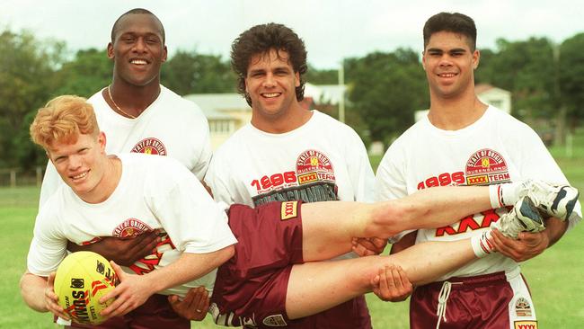 Brett Dallas held by 1996 Origin teammates Wendell Sailor, Steve Renouf and Matt Sing.