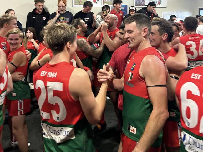 Lachlan Sharpe (No. 25) and Guy Hendry shake hands after Pines' win on Saturday. Picture: Darcy Swayn