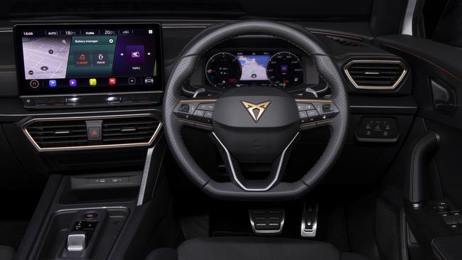 A digital dash and widescreen display join copper-coloured highlights in the cabin.