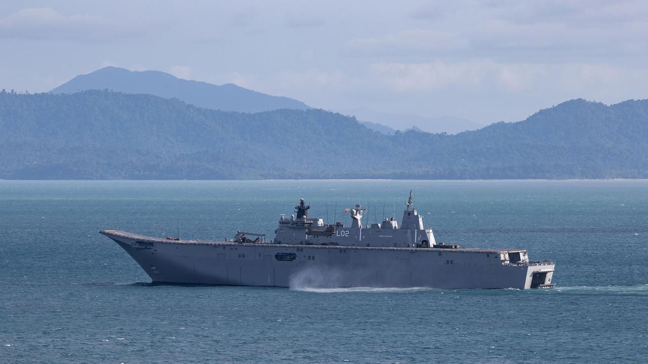 HMAS Canberra off the coast of Cowley Beach, Townsville.