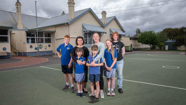 Winchelsea Primary School forks out $30,000 annually in basic upkeep tasks, council members Shae Callahan says, pictured with Megan Morris and students Tommy Humphries, Grace Morris with Patrick, Hannah and Elizabeth Humphries. Picture: Brad Fleet