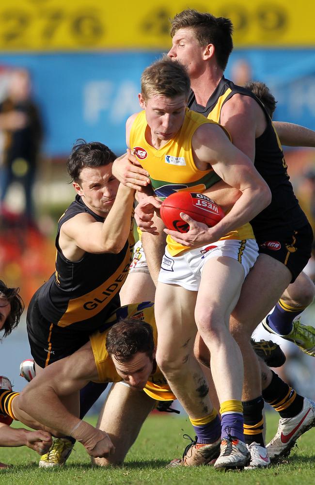 Reigning Eagles best and fairest Joe Sinor bursts through the pack. Picture: Calum Robertson