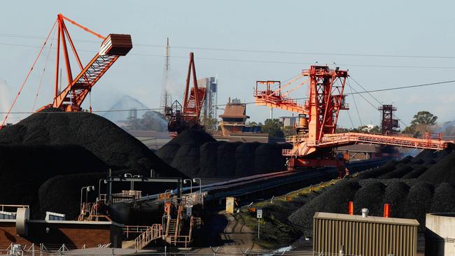 The big four banks have stated their intentions to restrict finance to coal production. Above, Newcastle coal operations. Picture: Bloomberg