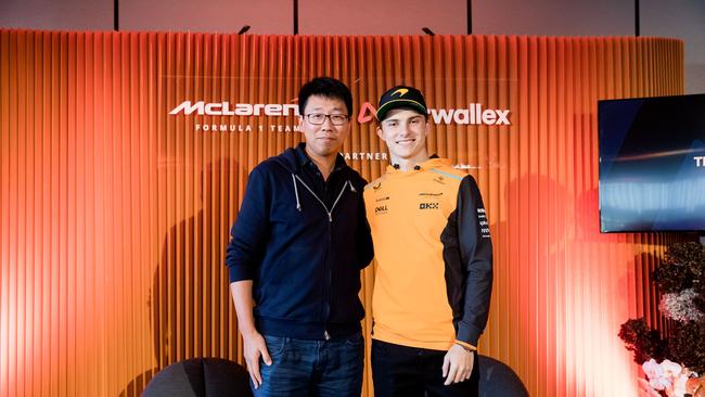 Airwallex founder and CEO Jack Zhang with McLaren F1 driver Oscar Piastri at the Australian Grand Prix.