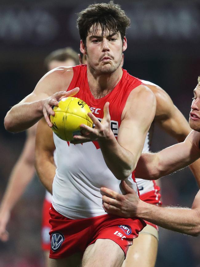 George Hewett tackled by Tom Mitchell. Picture: Phil Hillyard