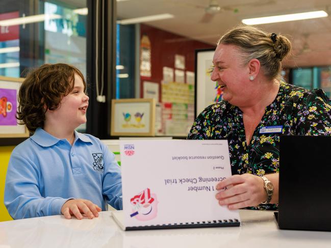 Sullivan Greiner, 6, with Stanmore Public School Stage 1 supervisor Richelle Pollack, demonstrating the new Year 1 numeracy check. Picture: Justin Lloyd