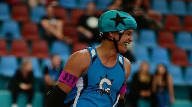 ALL SMILES: Corey Mills had made the Wizards of Oz, the Australian men's derby team.