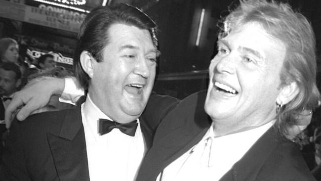 Derryn Hinch and John Farnham back in 1994. Hinch starred in the video with Jacki Weaver.