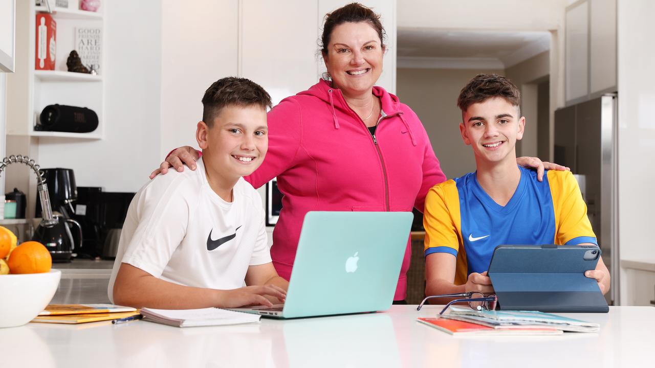 Locked down – again: Sharon Debevc with her two boys Mathew, 12, and Danyel, 14. The boys’ busy sports schedule is completely on hold, while their mum and dad Patryk both work from home full-time, juggling busy careers and homeschooling. Picture: Richard Dobson.