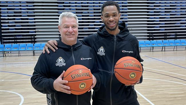 Melbourne United coach Dean Vickerman with import Rayjon Tucker. Picture: Shane Jones.