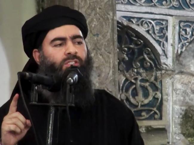 Abu Bakr al-Baghdadi, delivering a sermon at a mosque in Iraq during his first public appearance. Picture: AP