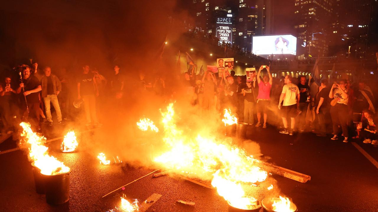 Israeli protesters block a road in Tel Aviv. Picture: AFP