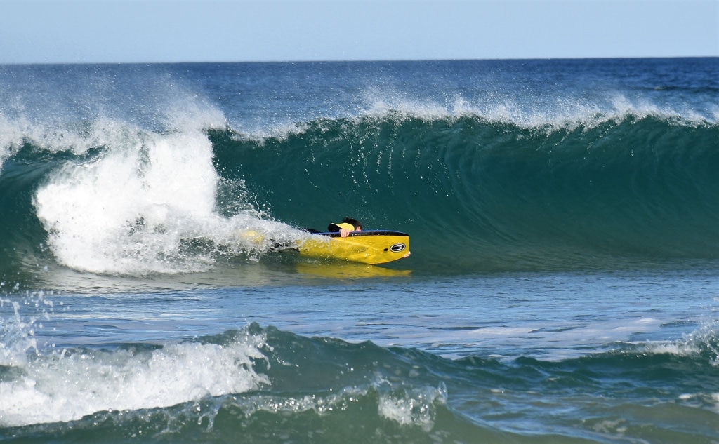 Surfers and bodyboard riders making the most of the waves at Kawana on the weekend. Picture: Mark Furler