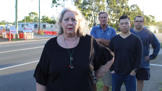 Cheryl Perkins (front) and Richard Perkins, Kevin Pan, and Michael Callice (back) are furious that the site office for the Murphy Rd and Ellison Rd upgrade has been set up right outside their homes. Picture: Ellen-Maree Elliot