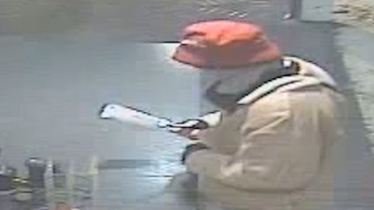Watch: Thief storms store armed with meat cleaver