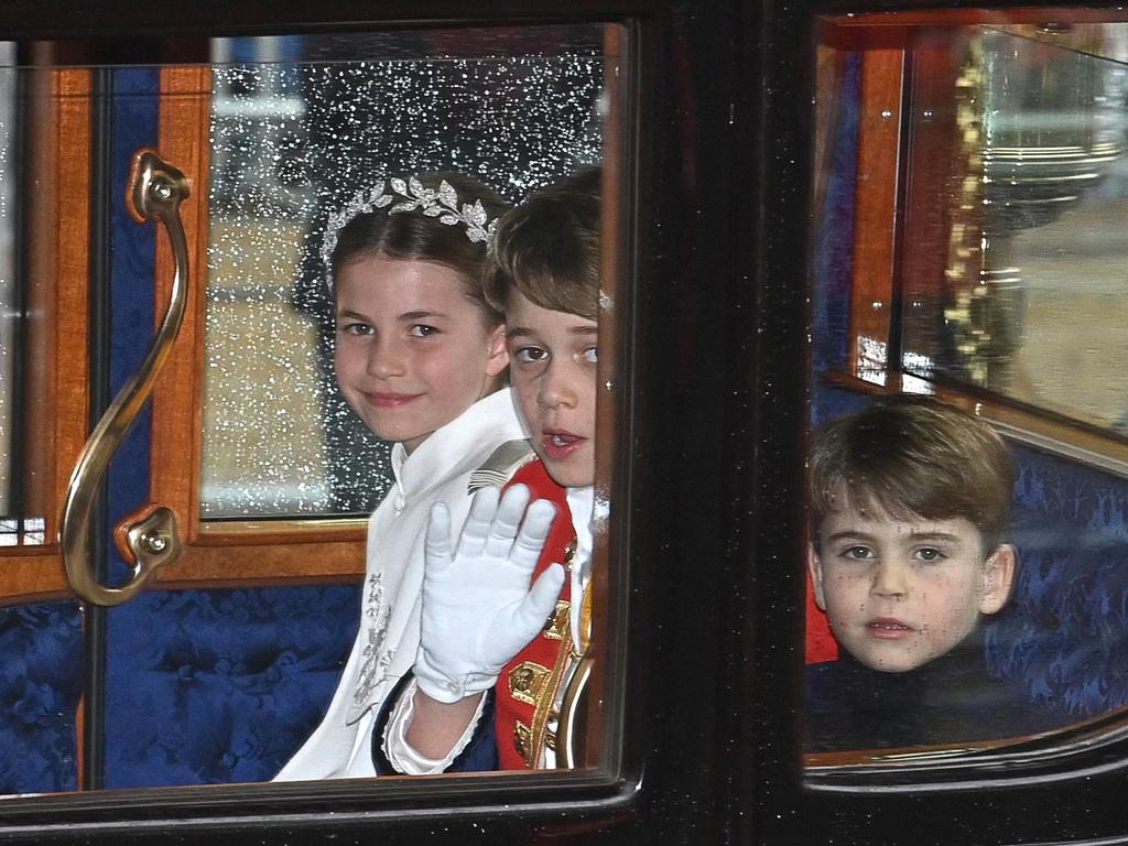 Prince George leads the royal wave with siblings Princess Charlotte and Prince Louis. Picture: Getty Images