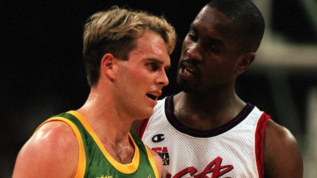 Shane Heal and Gary Payton get to know one another at the 1996 Olympic Games.