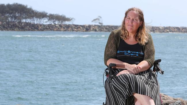 Kelly Fletcher has helped to clean up the Gold Coast's waterways over the years, but now needs help after a stroke. Friends have setup Go Fund Me page. Kelly Fletcher  surrounded by friends at the Spit. Glenn Hampson