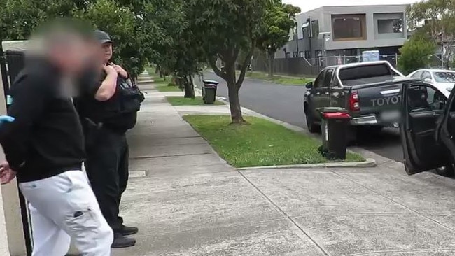 A man, alleged to be a member of the Bandidos, is arrested at a Pascoe Vale home in relation to an assault at a Geelong CBD nightspot on October 22. Photo: Victoria Police.