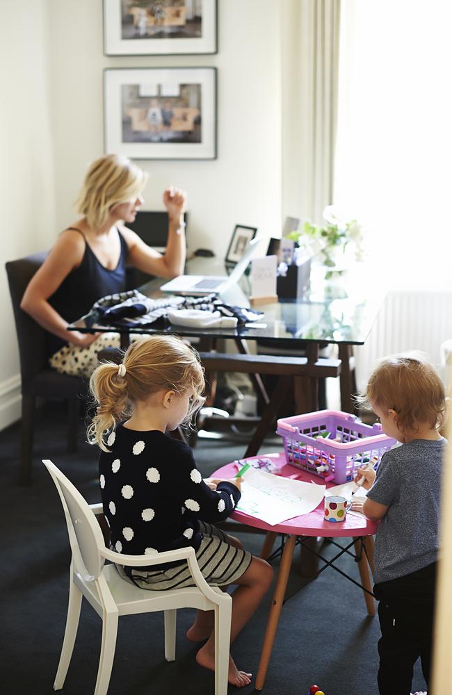 Her stylish home office features a table and chairs for the kids to play while she works. Photo: Nikole Ramsay