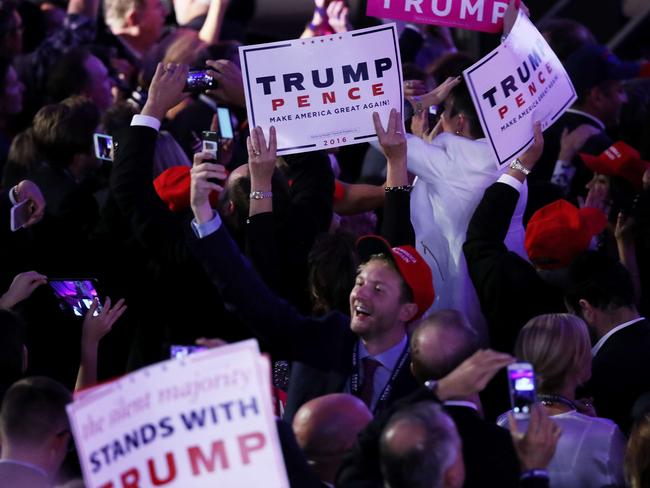 NEW YORK, NY - NOVEMBER 09: People celebrate during the call for Republican president-elect Donald Trump at his election night event at the New York Hilton Midtown on November 9, 2016 in New York City. at the New York Hilton Midtown in the early morning hours of November 9, 2016 in New York City. Donald Trump defeated Democratic presidential nominee Hillary Clinton to become the 45th president of the United States. Joe Raedle/Getty Images/AFP == FOR NEWSPAPERS, INTERNET, TELCOS & TELEVISION USE ONLY ==