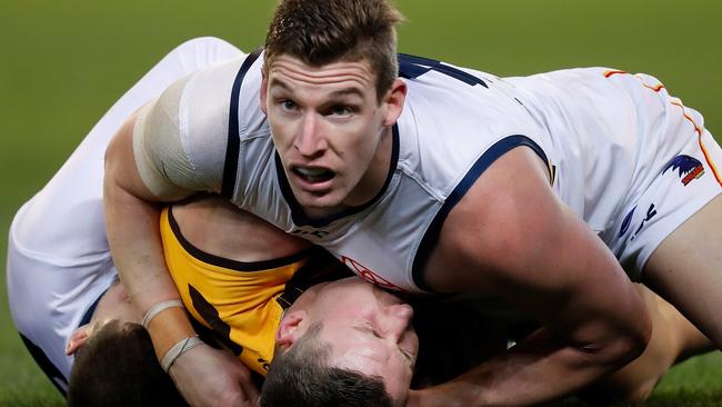 Josh Jenkins of the Crows looks for a free after laying a tackle on a Hawthorn opponent. Should the Crows throw him in the ruck for longer periods to make way for Darcy Fogarty? Picture: Michael Willson/AFL Media/Getty Images