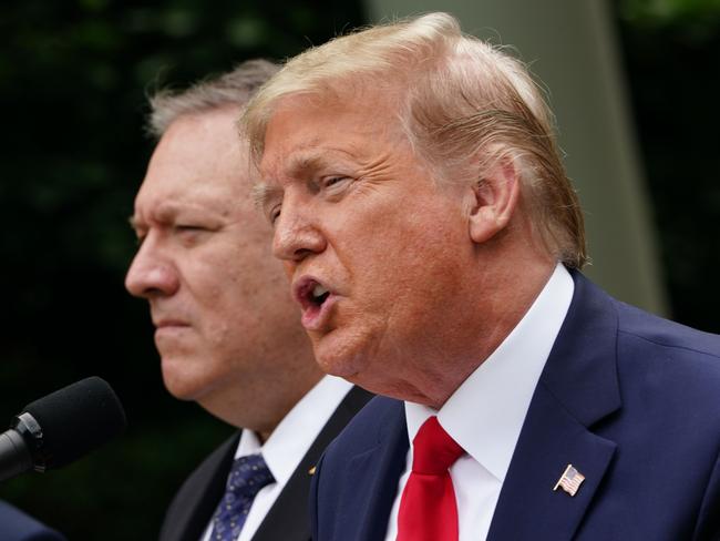 US President Donald Trump (right), with US Secretary of State Mike Pompeo, speaks to reporters in the Rose Garden of the White House in Washington, DC. Picture: AFP