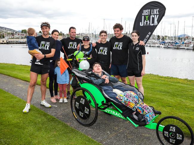 Jack Duffy with his team, from left, Sidney, Timmy, Natalie and Margot Bristow, Jack’s parents Chris and Erin Duffy, Xavier Duffy, support worker Josh Britton and Jamie Duffy. Picture: Mireille Merlet