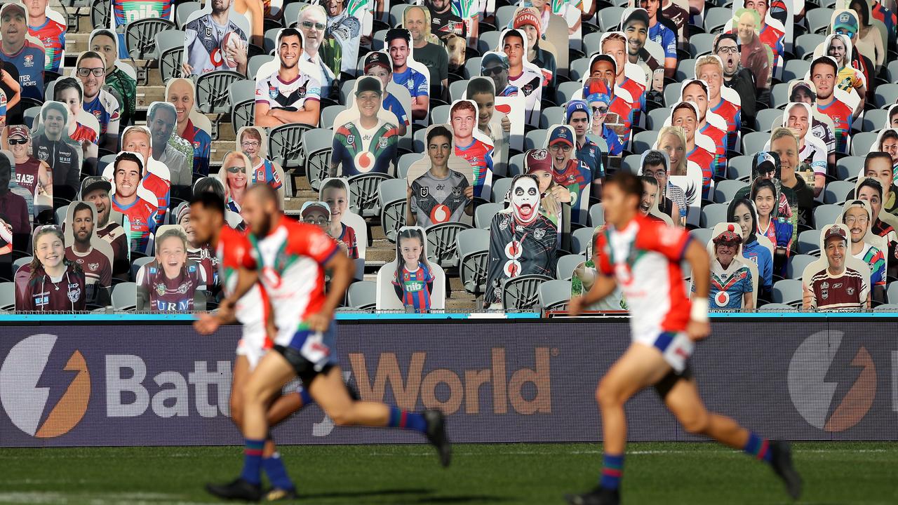 A cardboard cutout crowd in the stands at Central Coast Stadium.