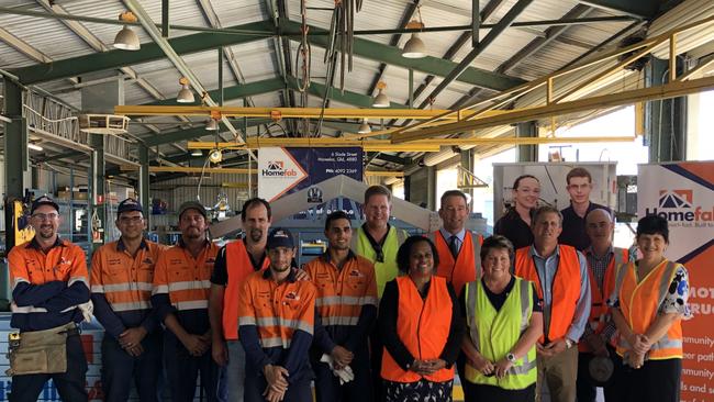 Then Fire and Emergency Services Minister Craig Crawford (seventh from right) and the Member for Cook, Cynthia Lui, were pictured with staff during a tour of Mareeba steel-framed building components manufacturer Homefab in 2019. A Queensland Government grant will help Homefab create more jobs.