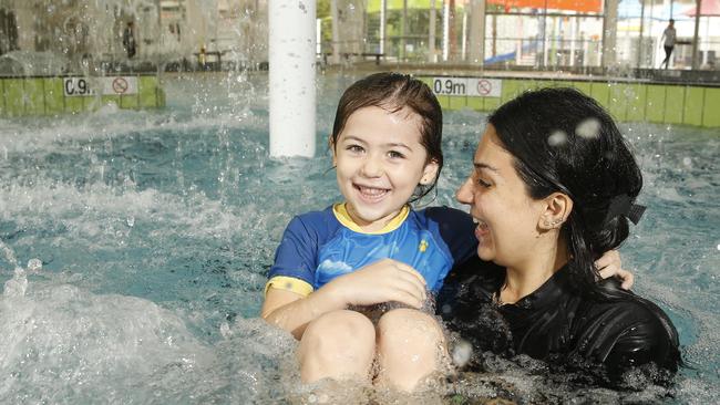 Ayla Agar with 4-year-old daughter Nisanur enjoying the new facilities in Auburn. Picture: Dave Swift.