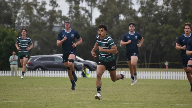 Samson Tuqiri in hot pursuit.