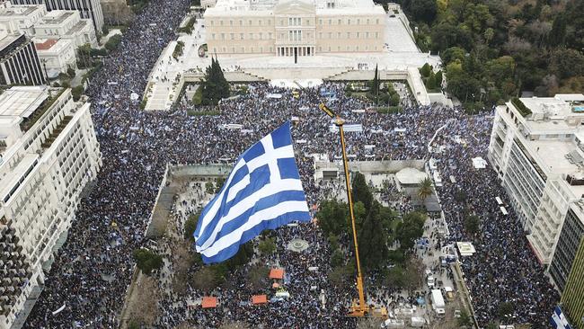 Demonstrators wave Greek national flags during a demonstration February 4 to protest a potential Greek compromise in a dispute with neighbouring Macedonia over the former Yugoslav republic's official name. Picture: Lefteris Partsalis/InTime News via AP