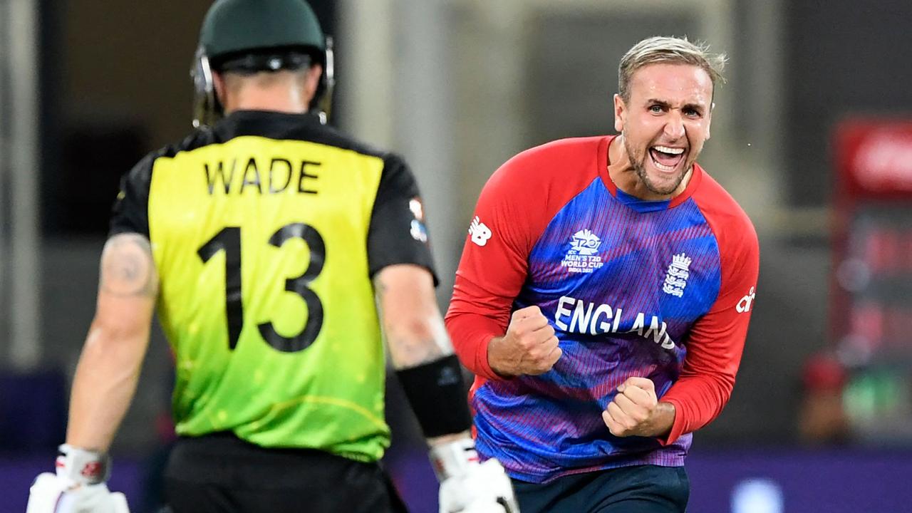 England's Liam Livingstone celebrates after taking the wicket of Australia's Matthew Wade. Photo by Aamir QURESHI / AFP.