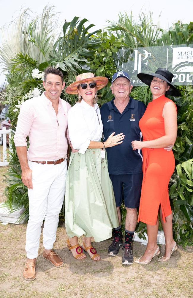 Billy Slater, Katie Page, Gerry Harvey and Nicole Slater enjoying a day in the sun with thousands of jubilant revellers. Picture: Luke Marsden.