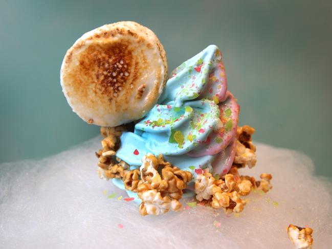 Profile on new ice cream store at Chatswood, Aqua S. Creations include soft serve blue ice-cream perched upon a cone topped with fairy floss, sweet popcorn, popping candy and grilled marshmallow.