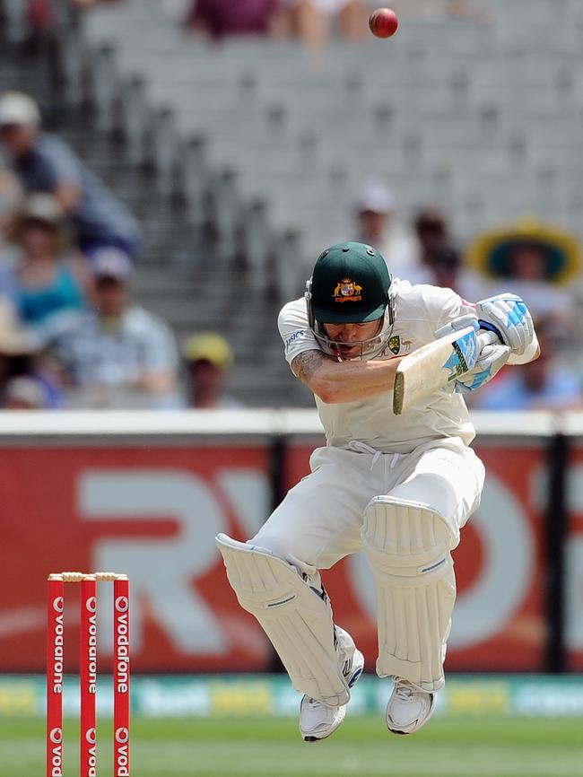 Shaminda Eranga hits Australia's Michael Clarke on the helmet at the MCG. Picture: AP Photo/Andrew Brownbill)