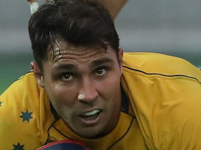 YOKOHAMA, JAPAN - NOVEMBER 04:  Nick Phipps of Australia dives over for a try during the rugby union  international match between Japan and Australia Wallabies at Nissan Stadium on November 4, 2017 in Yokohama, Kanagawa, Japan.  (Photo by David Rogers/Getty Images)
