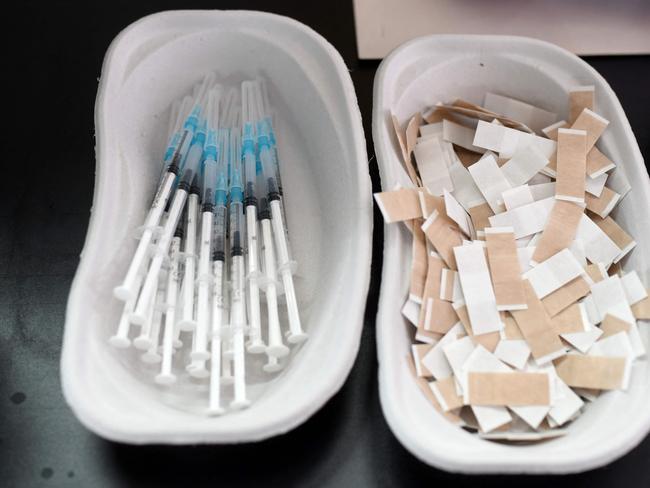 Prepared syringes with the Moderna vaccine are seen at a mobile vaccination station in Cologne, Germany. Picture: AFP