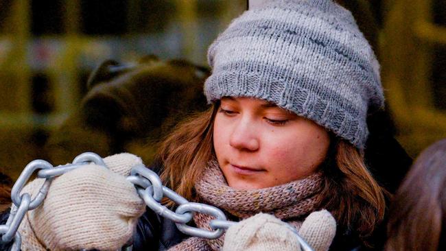 Swedish climate activist Greta Thunberg (2nd L) is seen among campaigners during an action staged on March 2, 2023 in Oslo, in a protest against wind turbines built on land traditionally used to herd reindeer. - Thunberg and dozens of indigenous Sami activists continued to block access to Norwegian ministries, protesting against the operation of contested wind turbines in the Fosen region of western Norway, more than a year after a landmark ruling by the Norwegian Supreme Court. (Photo by Javad Parsa / NTB / AFP) / Norway OUT