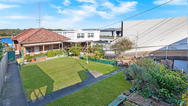 Humble red brick house sells for price of mansion