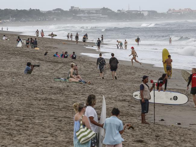 Tourists seen at Canggu Beach in Bali earlier this year. Picture: Johannes P. Christo