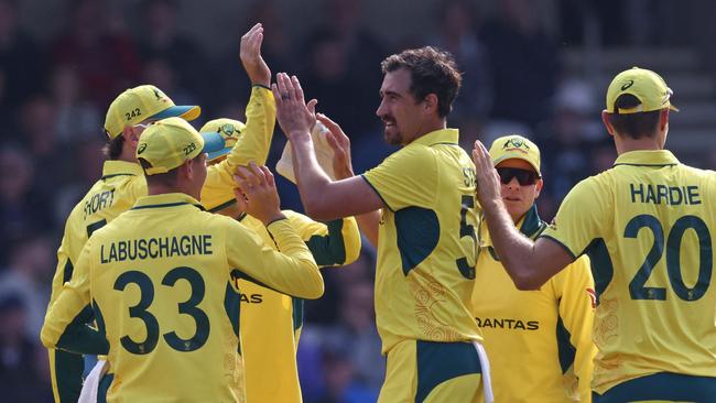 Australia's Mitchell Starc (C) celebrates with teammates after taking the wicket of England's Harry Brook during the 2nd One Day International cricket match between England and Australia at Headingley in Leeds, northern England  on September 21, 2024. (Photo by Darren Staples / AFP) / RESTRICTED TO EDITORIAL USE. NO ASSOCIATION WITH DIRECT COMPETITOR OF SPONSOR, PARTNER, OR SUPPLIER OF THE ECB